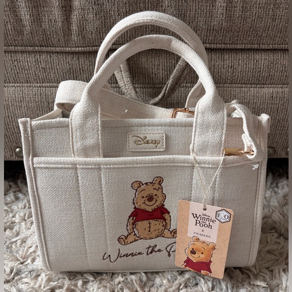 Disney Handbags - Disney Winnie the Pooh Cream White Canvas Tote Bag NWT